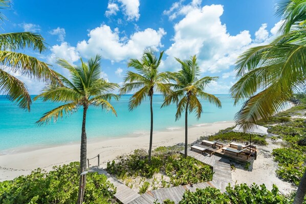 On the beach, sun-loungers, beach towels