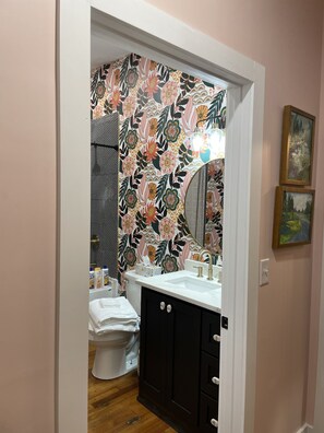 Hair dryer, towels, soap, shampoo