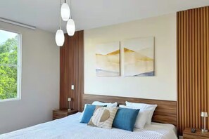 A modern bedroom with a large bed, a wooden headboard, and a view of the outdoors through a window.