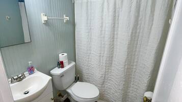 Hair dryer, towels, soap, shampoo