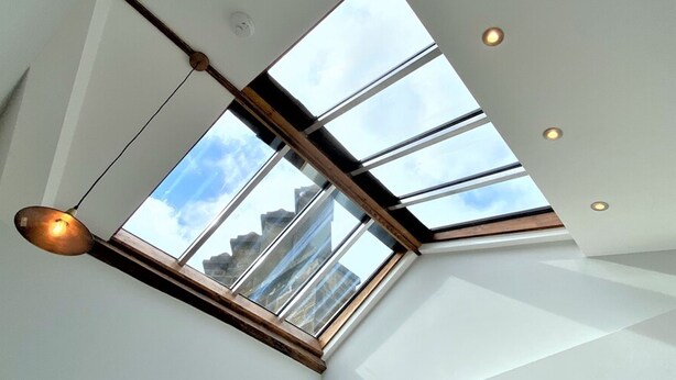 A skylight with a modern design, allowing natural light into the room. - Town Hall Lofts Flat 2 Settle (Settle)