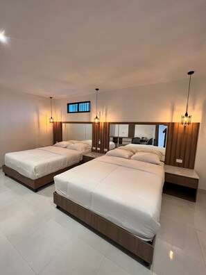 Suite Keluarga | 1 kamar tidur, tirai kedap cahaya, dan setrika/meja setrika