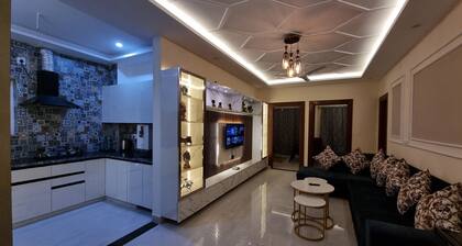 Hillside nest 2 BHK apartment with a hill and mussoorie view.