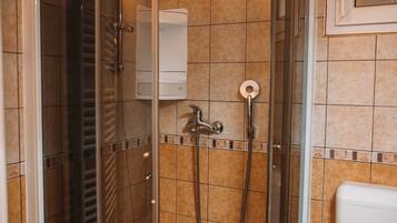 Apartment (One Bedroom Apartment) | Bathroom | Shower, free toiletries, towels