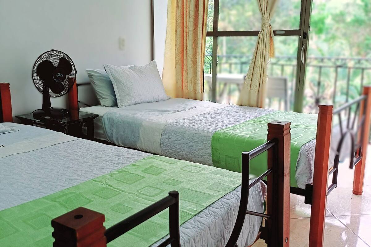 Standard Double Room, River View | Minibar, bed sheets