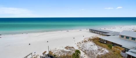 On the beach, sun loungers, beach towels