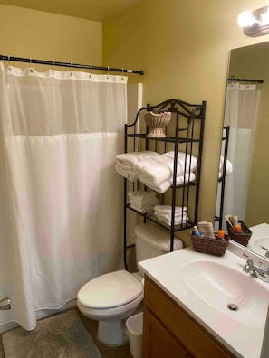 Hair dryer, towels, soap, toilet paper
