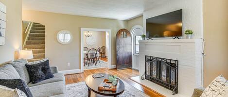 TV, fireplace, books