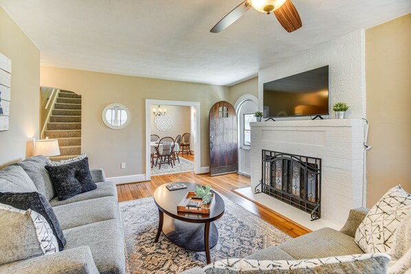 TV, fireplace, books