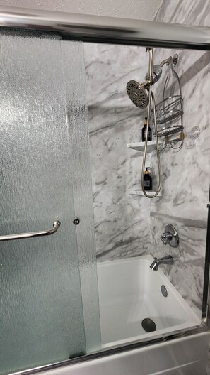Shower, towels, soap, shampoo