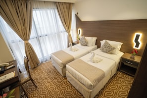 Habitación doble Deluxe | Ropa de cama de alta calidad, minibar y wifi gratis