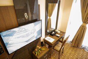 Habitación individual Deluxe | Ropa de cama de alta calidad, minibar y wifi gratis