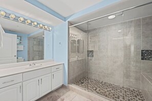 Shower, hair dryer, towels