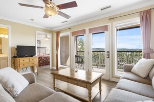 Deluxe Condo, 2 Bedrooms, Lake View | Living room | 32-inch flat-screen TV with cable channels