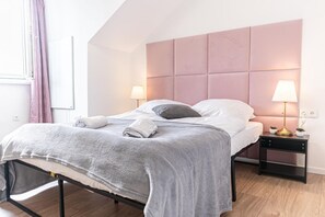 2 dormitorios, tabla de planchar con plancha, wifi y ropa de cama