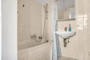 Hair dryer, towels, soap, shampoo