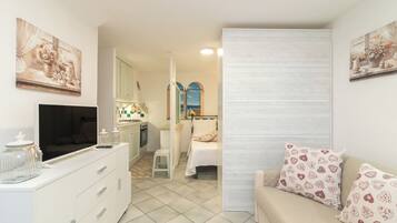 1 slaapkamer, een strijkplank/strijkijzer, wifi, beddengoed