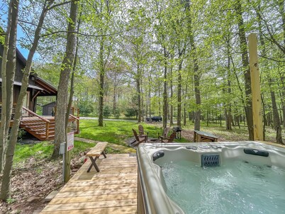 Amazing Outdoor Space with Amenities Galore! Hot Tub, Fire Pit, and More!