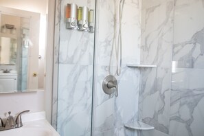 Hair dryer, towels, soap, shampoo