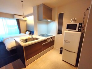 Deluxe-Zimmer, 1 Schlafzimmer | Eigene Küche | Kühlschrank, Mikrowelle, Wasserkocher