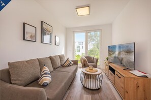 Télévision, table de tennis de table