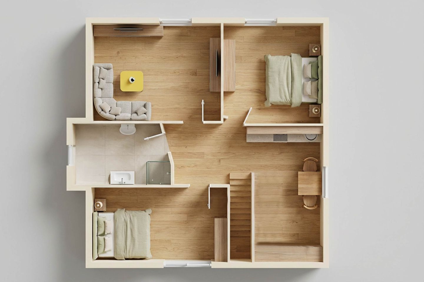 Blick von oben auf einen Raum mit einem Bett, einem kleinen Tisch, einer Couch und einem Schrank.