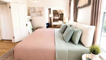 1 bedroom, desk, iron/ironing board, travel crib