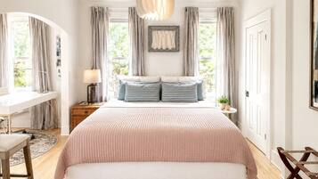 1 bedroom, desk, iron/ironing board, travel crib