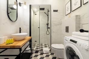 Shower, free toiletries, hair dryer, towels