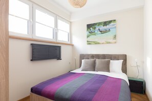 2 habitaciones, tabla de planchar con plancha, wifi y ropa de cama 