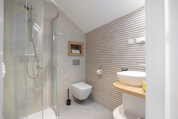 Shower, free toiletries, hair dryer, towels