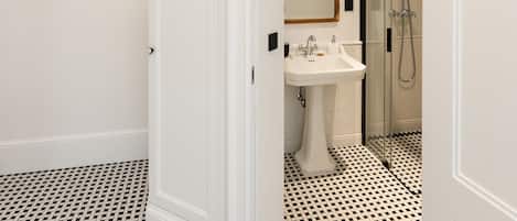 Shower, free toiletries, hair dryer, slippers