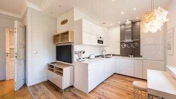 Fridge, microwave, stovetop, coffee/tea maker