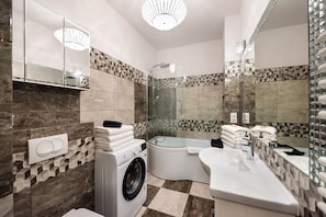 Shower, free toiletries, hair dryer, towels