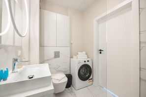Shower, free toiletries, hair dryer, towels