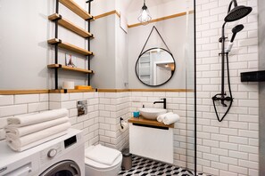 Shower, hair dryer, towels