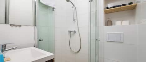 Shower, hair dryer, towels, soap