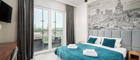 1 dormitorio, tabla de planchar con plancha, wifi y ropa de cama