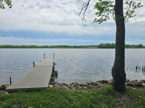 Relax in 3 bed, 2 bath house on quiet 2 acres with private lake. 