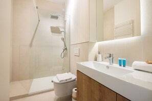 Shower, free toiletries, hair dryer, towels