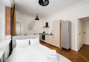 1 habitación, tabla de planchar con plancha, wifi y ropa de cama 
