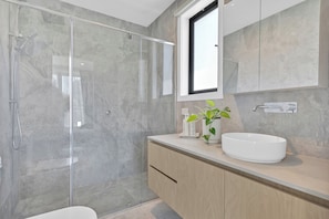 Shower, hair dryer, towels, soap