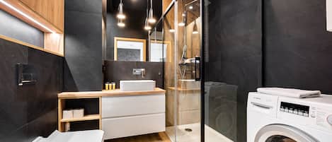 Shower, free toiletries, hair dryer, towels