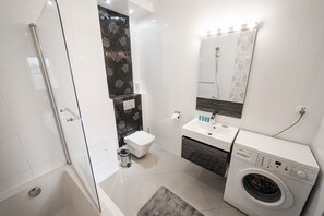 Shower, free toiletries, hair dryer, towels