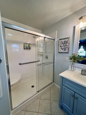 Shower, hair dryer, towels, soap