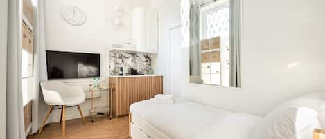 1 habitación, tabla de planchar con plancha, wifi y ropa de cama