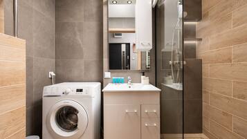 Shower, hair dryer, towels