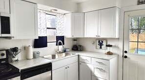 Private kitchen - Newly updated, cozy beach retreat.  Duplex one mile from the white sandy beaches (Panama City)