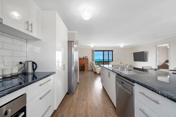 Dining tables - Escape to Paradise - Beach views 5bedrooms, 2 Kitchens, 2 Living, 2 Bathrooms (Paradise Beach)