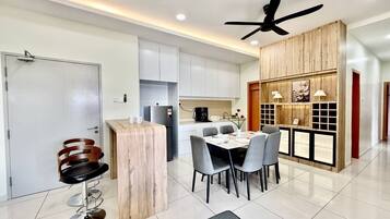 Family Apartment, 4 Bedrooms, Non Smoking, City View | In-room dining